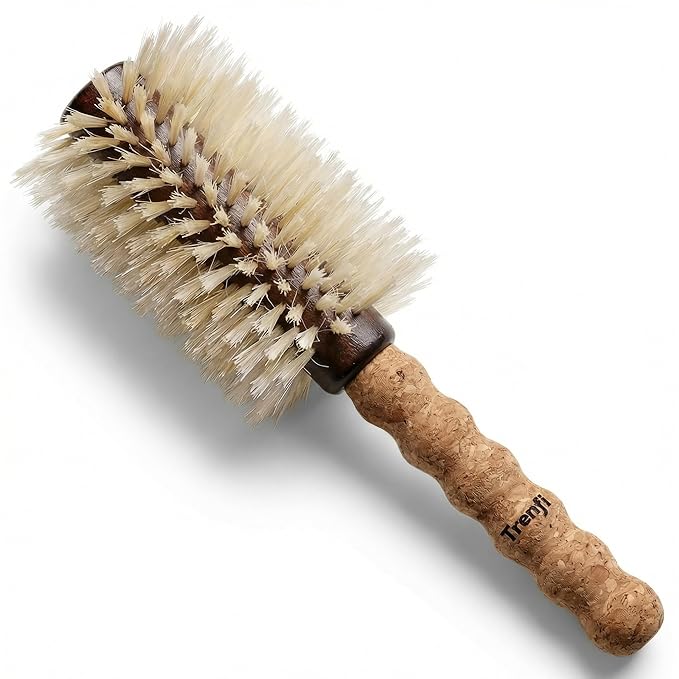 Round brush with bristles and cork handle on a white background